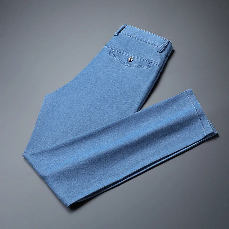 2025 Spring Summer New Men's Thin Light Blue Loose Jeans Business Fashion Lyocell Fabric Stretch Denim Trousers Male Brand Pants